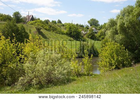 Bezuzhevo Village, Russia - 28 May 2018: Pronya River Bank And Country Houses In Zarya Garden Plot. 