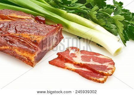 Pieces Of Pork Balyk With Fresh Green Lettuce On The White