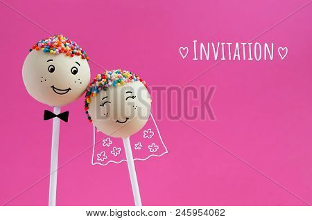 Wedding Invitation Card. Cake Pops With Drawn Smiling Faces. Sweet Couple In Love. Concept Photo For
