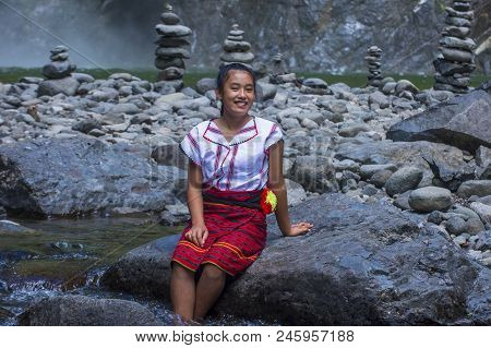 Batad, Philippines - May 02 : Girl From Ifugao Minority Near A Waterfall In Batad The Philippines On