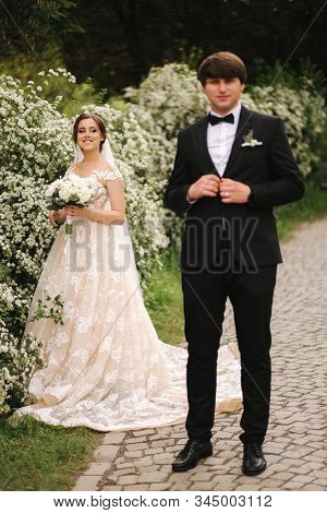 Handsome Groom Staind In Front Of Beutiful Bride