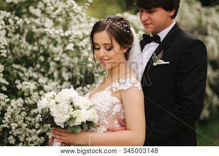 Handsome Groom Staind In Front Of Beutiful Bride