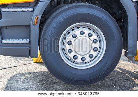 Chromed Truck Wheel Closeup. Heavy Duty Semi Truck Wheel.