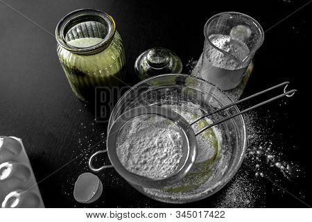 Ingredients For Home Baking: Cookies, Bread, Cake. Flour, Sugar, And Eggs Are On The Black Table. Ba