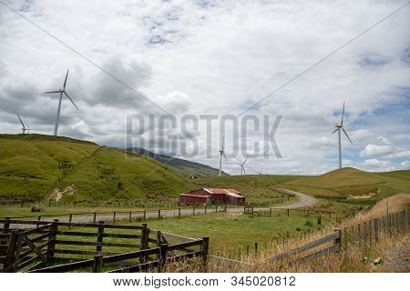 Rural Agricultural Scenery Of A Farm And Its Sheep And Cattle Yards On The  Hills And Valleys With E
