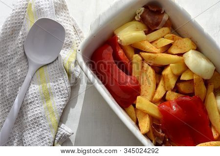 Roasted Potatoes Whit Paprika And Spices Ready To Cook , Baked