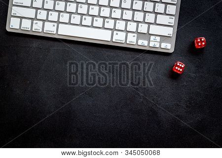 Hazard Gemes Online Concept. Dices Near Keyboard On Black Background Top-down Copy Space