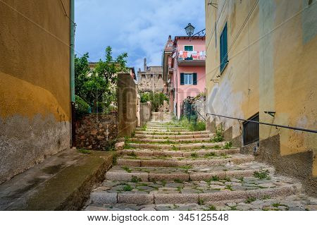 Santo Stefano Old Town Narrow Street Going Uphill. Toscana, Italy