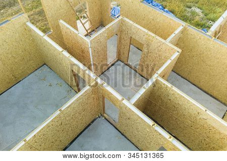Construction Of New And Modern Modular House. Walls Made From Composite Wooden Sip Panels With Styro
