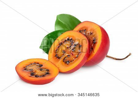 Fresh Tamarillo Fruit Half With Leaves Isolated On White Background