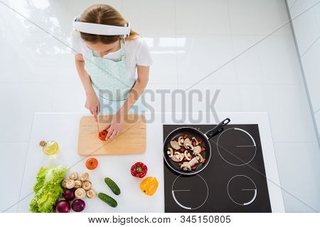 Hign Angle Photo Of Housewife Spending Morning Listening To Music Modern Earphones Chopping Tomatoes