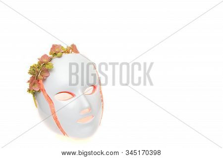 Color Therapy Mask Glowing Red With Flower Crown On White Backfround