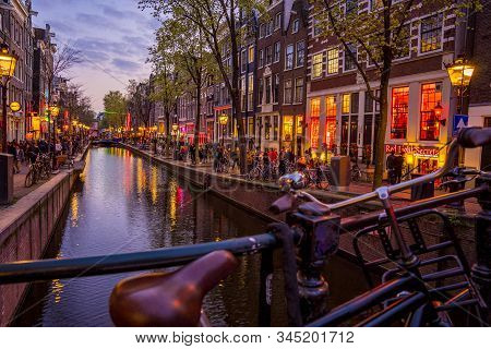 Amsterdam, Netherlands. June 10, 2019. Amsterdam City Skyline Sunset Timelapse At Canal Waterfront, 