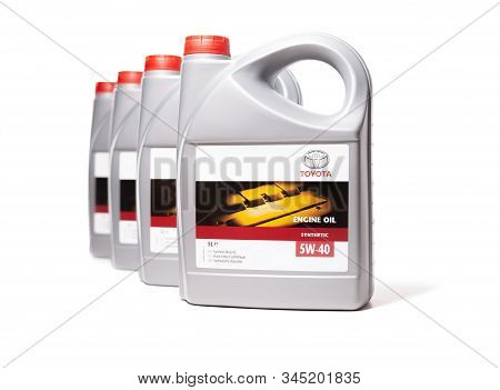 Kharkiv, Ukraine - December 6, 2019: Row Of Plastic Cans With Motor Synthetic Oil Toyota 5w-40 For E