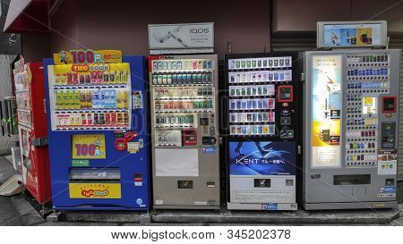 Osaka, Japan- 28 Nov, 2019: Unmanned Vending Machines Selling Soft Drinks And Tabaco On Side Of Road
