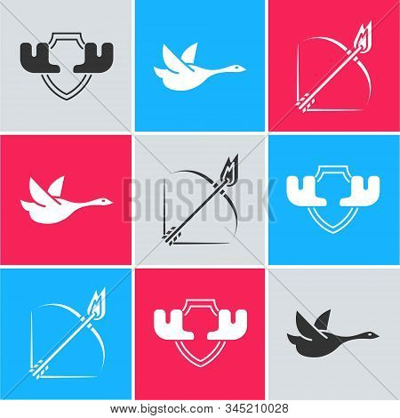 Set Moose Horns On Shield, Flying Duck And Bow And Fire Arrow Icon. Vector