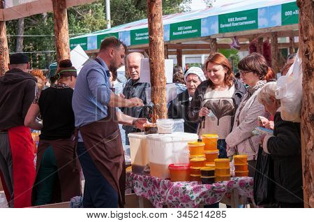 Russia, Khabarovsk, September 8, 2018: Harvest Festival, Sale Of Honey