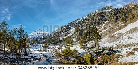 Small River In The Snowy Pyrenees Mountains, Near Pont Espagne