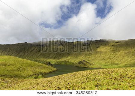 Beautiful Greens Below Blue Sky And White Clouds In The Corvo Caldera On The Island Of Corvo In The 
