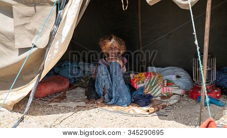 Shiraz, Iran - May 2019: Old Qashqai Turkish Nomadic Woman Inside Her Tent. The Qasqhai Are Nomadic 