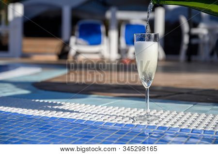 Pool Party With One Glass Of Bubbles White Champagne Or Cava Wine, Romantic Event On All Inclusive H