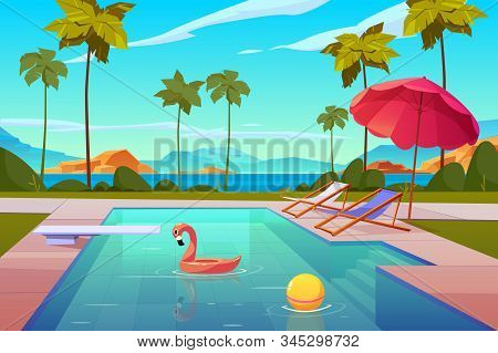 Swimming Pool In Hotel Or Resort Outdoors, Empty Poolside With Chaise Lounges, Umbrella, Inflatable 