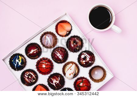Box Of Tasty Chocolate Candies And Cup Of Coffee Homemade Cocolate Candy Tasty And Beautiful Dessert