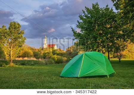 Camping tent at scenic capmsite near Donauworth, a part of popular Romantic Road touristic route in Bavaria, Germany