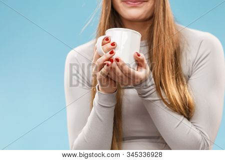 Woman In Winter Gray Sports Thermal Underwear For Skiing Training Holds Mug With Tea Or Coffee Warmi