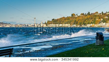 A View Of Elliott Bay With Alki Beach Condos In The Distance.