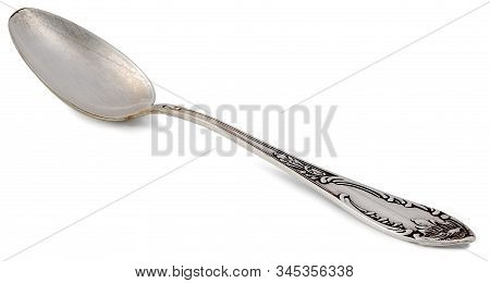 Single Vintage Old Large Silver Cupronickel Spoon Isolated On White Background.