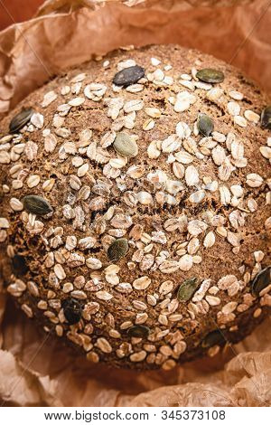 Whole Grain Traditional Rye Bread In Parchment Paper