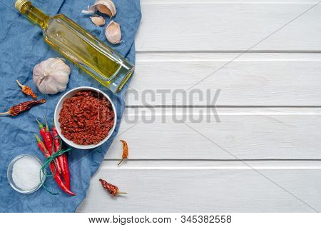 Spicy Chili On A Light Background, Flatlay. Used As An Ingredient For Harissa, Ajika, Muhammara. Red
