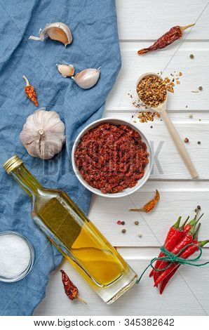 Spicy Chili On A Light Background, Flatlay. Used As An Ingredient For Harissa, Ajika, Muhammara. Red