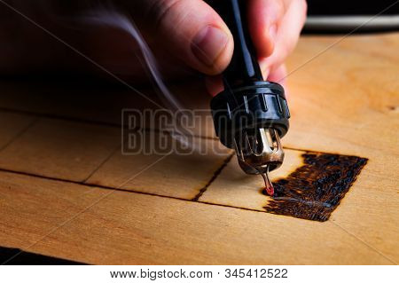 Pyrography. Wood Burning With Pyrography Pen. Close Up