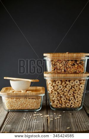 Breakfast Cereal. Glass Boxes With Granola, Cereal Rings And Quinoa Pops. Cereal Loops In A Bowl. He