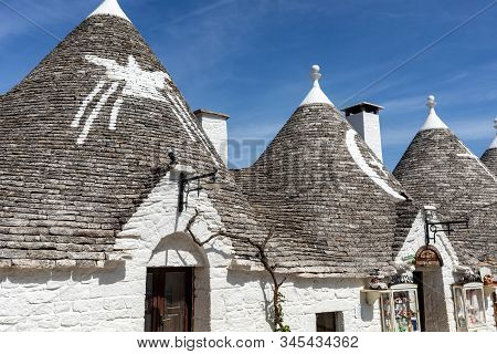 Alberobello, Italy - September 16, 2019: Tradtional White Houses In Trulli Village. Alberobello, Ita