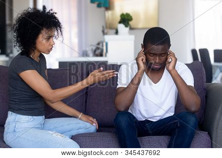 Indifferent Black Husband Ignore Pushy Wife Lecturing