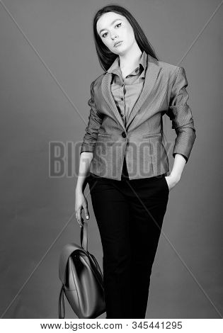 Stylish Woman In Jacket With Leather Backpack. Girl Student In Formal Clothes. Student Life. Smart B