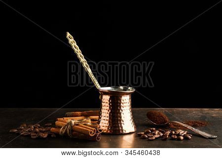 Turkish Coffee Maker And Ingredients On A Rustic Metal Table