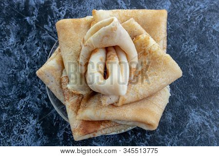 Stack Of Traditional Russian Pancakes Blini On Gray Background With Copy Space. Homemade Russian Thi
