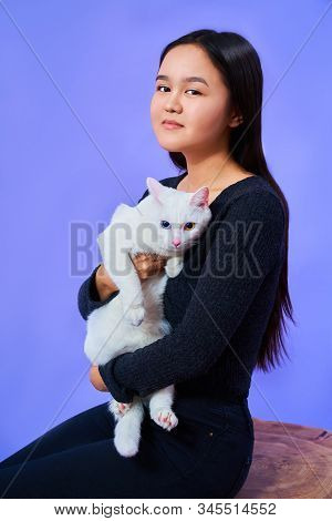 Cat With Different Eye Color, Girl Holds A White Cat, Bright Colours