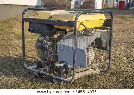 Close-up. Street Lighting. A Gasoline-powered Generator That Produces Current. Backup Or Emergency P
