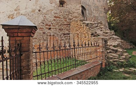 Ostrog, Ukraine, August 2007 The Foot Of The Round Tower Of The Ostrog Castle In Western Ukraine. Th