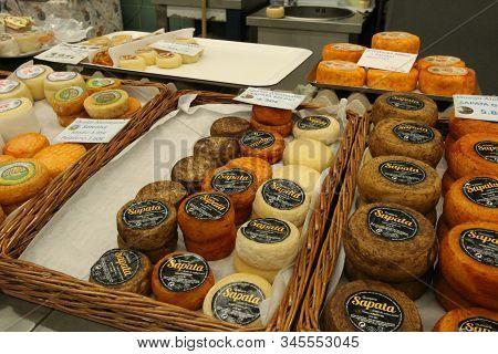 Oporto, Portugal- December 31, 2019: Diverse Kind Of Typical Portuguese Cheeses For Sale At A Market