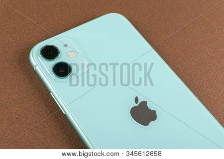 Helsinki, Finland, January 13, 2020: Apple Iphone 11 Camera Close Up On Office Desk. Studio Shot Of