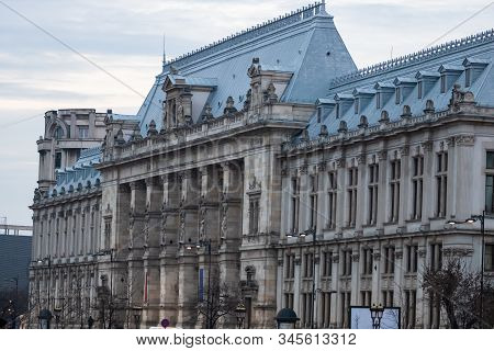 Palace Of Justice Building (palatul Justitiei) Early In The Morning. View Over Dambovita River In Bu