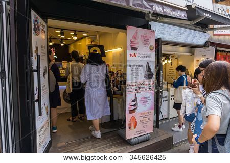 Seoul, South Korea - June 15, 2018: Crowed Tourist And Visitor At Ewha Shopping Street, The Famous S