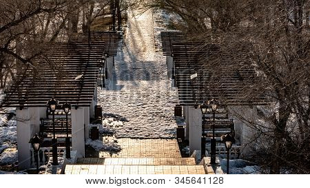 Pergolas On A Winter Park Path In City Volgsky