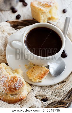 Cup Of Coffee With Pasticciotto Pastry On A Rustic Background Close Up